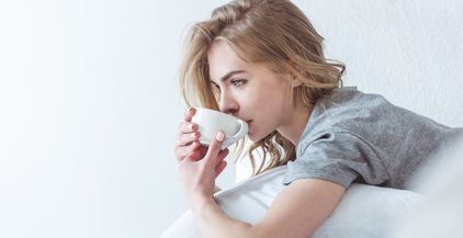 beautiful-pensive-woman-drinking-coffee-and-relaxi-2022-04-20-14-28-58-utc (1)