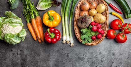 fresh-organic-vegetables-on-rustic-background-2021-08-26-22-39-39-utc