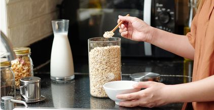 woman-making-instant-oats-2021-09-02-15-10-44-utc