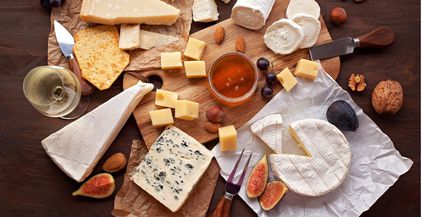 variety-of-different-cheese-with-wine-fruits-and-2021-08-30-13-51-21-utc
