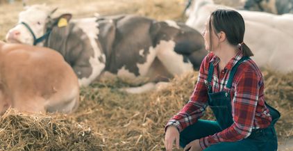 female-farmer-on-cow-dairy-farm-2021-08-27-23-44-49-utc