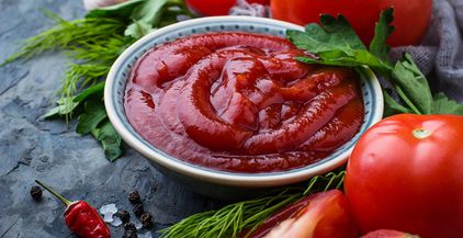 tomato-ketchup-sauce-on-concrete-background-2021-08-26-19-01-47-utc (1)