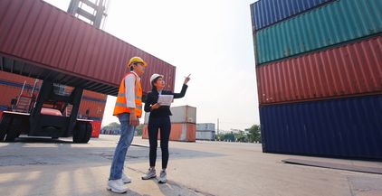 foreman-inspecting-containers-at-import-export-car-2021-10-04-18-37-26-utc