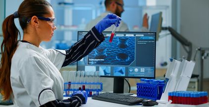 scientist-doctor-looking-at-blood-sample-and-writi-2021-08-30-17-43-49-utc