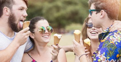 friends-eating-ice-cream-cones-smiling-2022-03-07-23-55-59-utc