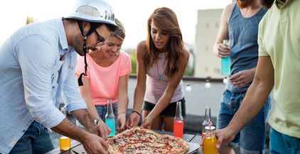 friends-and-pizza-young-cheerful-people-eating-pi-2021-08-26-17-33-52-utc