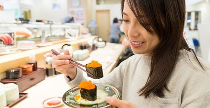 woman-eating-sushi-2021-08-28-20-46-06-utc