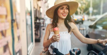 beautiful-woman-eating-ice-cream-2021-08-26-17-30-00-utc