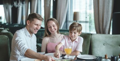 happy-family-in-a-restaurant-2021-08-26-15-47-32-utc