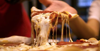 eating-pizza-with-hand-2021-09-04-18-22-16-utc