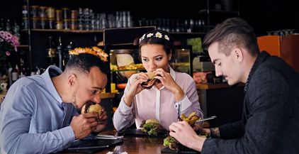 three-people-eats-sandwiches-2021-08-28-12-31-13-utc