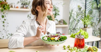 woman-with-healthy-green-food-2021-12-23-15-27-20-utc