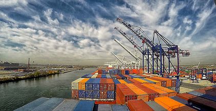 containers-on-cranes-in-export-terminal-port-2022-03-21-12-37-56-utc