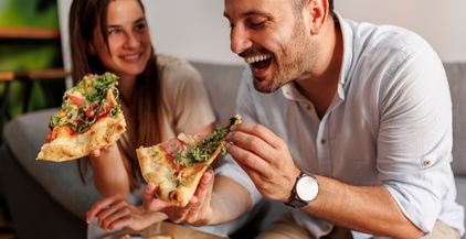 couple-eating-pizza-2022-01-31-23-42-16-utc
