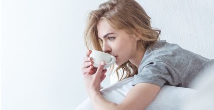 beautiful-pensive-woman-drinking-coffee-and-relaxi-2022-04-20-14-28-58-utc (1)