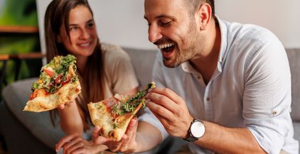 couple-eating-pizza-2022-01-31-23-42-16-utc