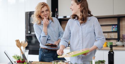 mother-and-daughter-teenager-cooking-together-2021-12-09-08-20-39-utc (1)